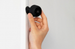 close-up-hand-holding-camera_23-2148994190
